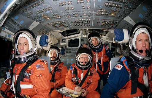 STS-29 Discovery, OV-103, crewmembers in JSC crew compartment trainer (CCT)