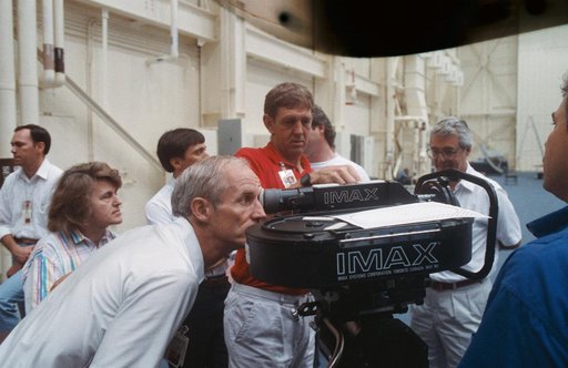 STS-34 crewmembers train with the IMAX camera in JSC's Bldg 9B mockup area