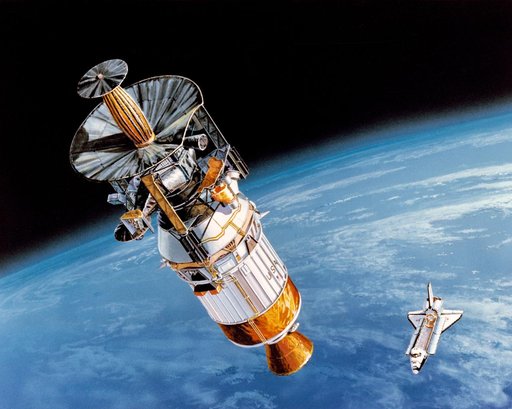 Artist concept of Galileo with inertial upper stage (IUS) in low Earth orbit
