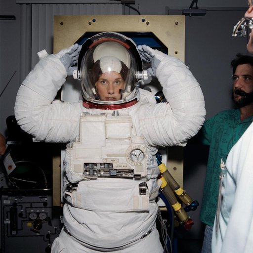 Astronaut N. Jan Davis participates in EMU suit fitcheck at JSC