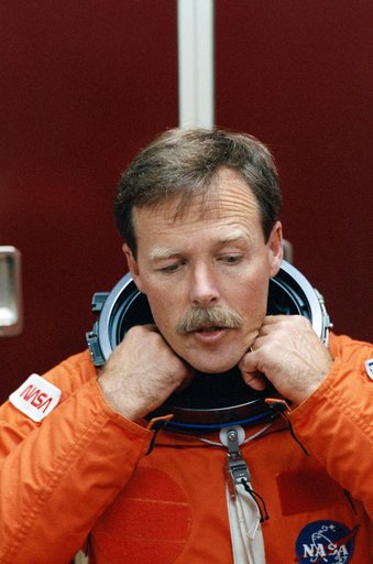 STS-47 Commander Gibson dons LES prior to JSC launch egress training