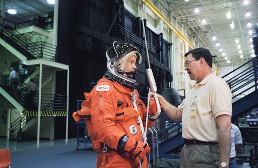 Astronaut Michael E. Lopez-Alegria during post-landing egress training