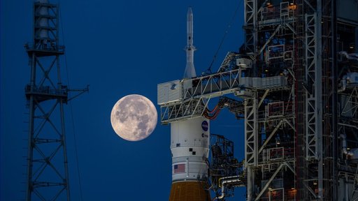 SLS at the Pad with the Moon