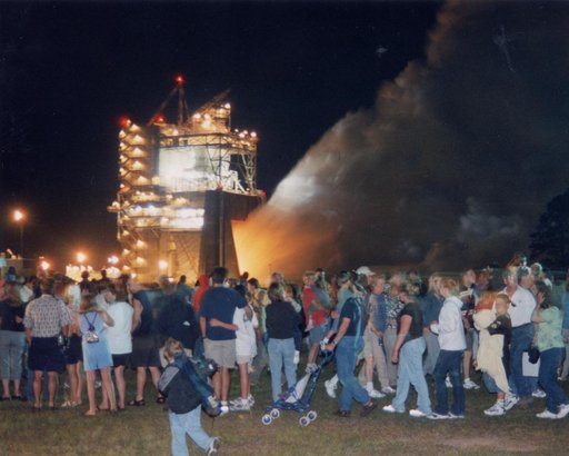 Public views evening engine test of a Space Shuttle Main Engine