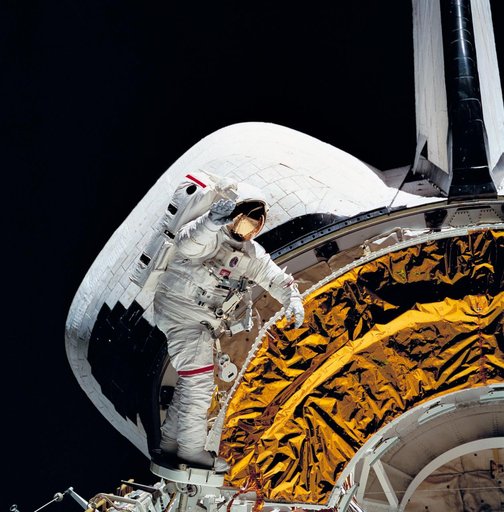 Astronaut Carl Walz test portable foot restraint in aft cargo bay