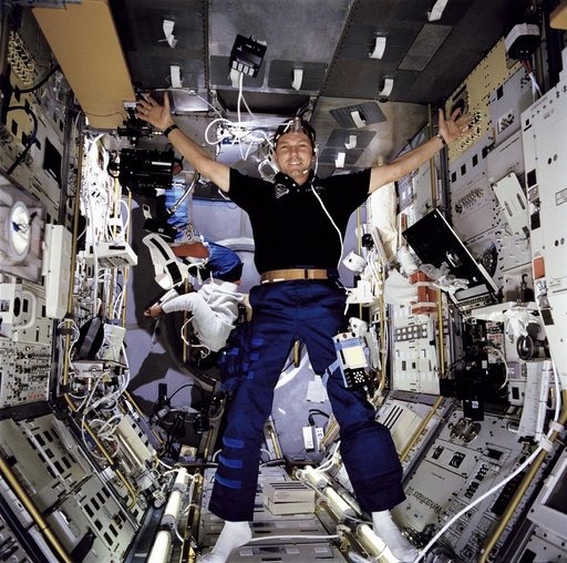 STS-55 German payload specialist Schlegel and MS3 Harris work in SL-D2 module