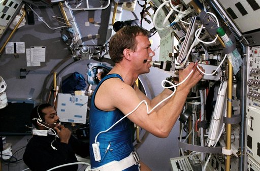 STS-55 MS3 Harris & Payload Specialist Schlegel conduct Anthrorack experiment