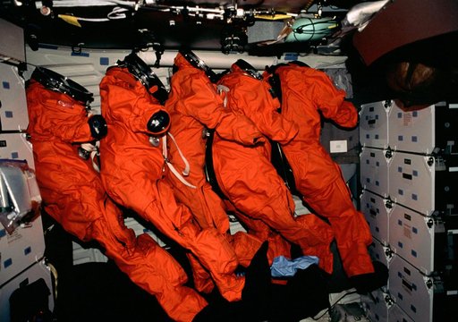 Orange LESs lined up on middeck on re-entry day