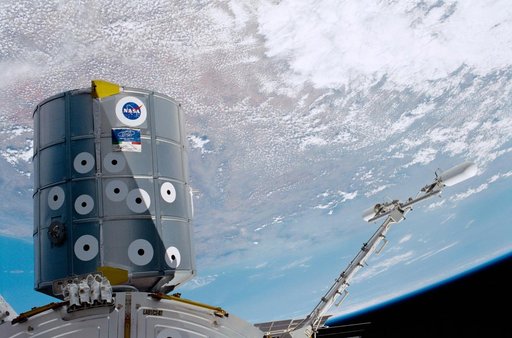 View of the MPLM, Destiny and the UHF antenna taken during the second EVA of STS-100