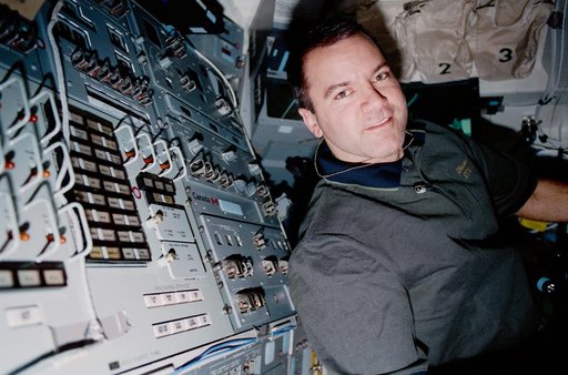 Richards in the orbiter flight deck