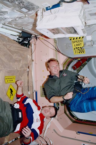 STS-102 crewmember activity in the ISS