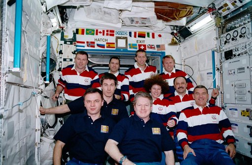 STS-102, and Expeditions One and Two crewmembers pause for a portrait
