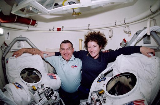STS-102 crewmember activity in the middeck