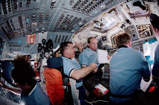 STS-102 flight deck activity during post-docking ops with the ISS