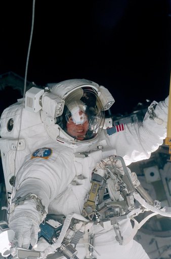 Helms during EVA on the ISS