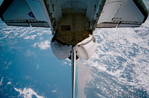 The orbiter payload bay is photographed from U.S. Laboratory