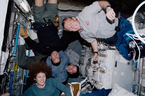STS-102 Crewmember group activity in the ISS MPLM/Leonardo