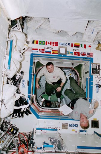 Thomas and Kelly in U.S. Laboratory hatch