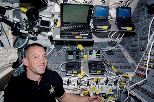 STS-104 PLT Hobaugh and DV Cam units on Atlantis flight deck