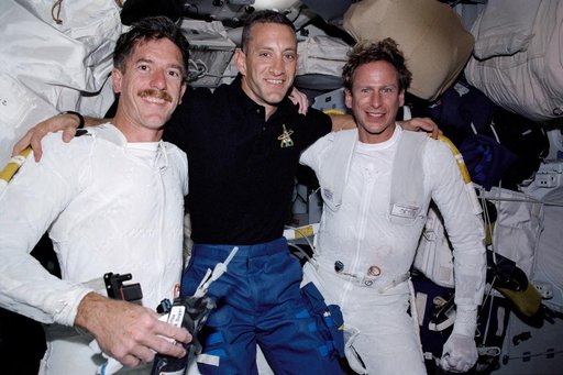 STS-104 PLT Hobaugh with EVA crew MS Reilly and Gernhardt after EVA 1