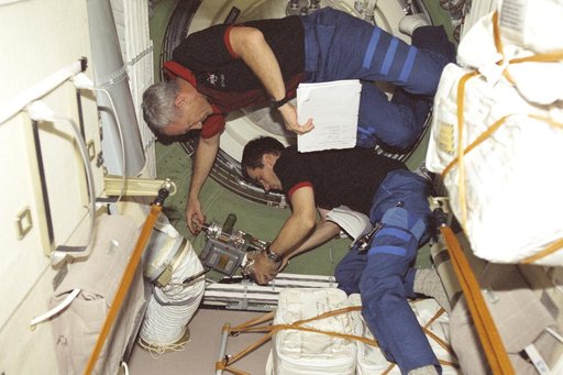 Wilcutt and Malenchenko perform egress procedures in Zarya during STS-106