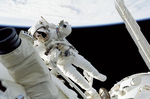 MS Malenchenko waves while working on Zvezda during STS-106's EVA