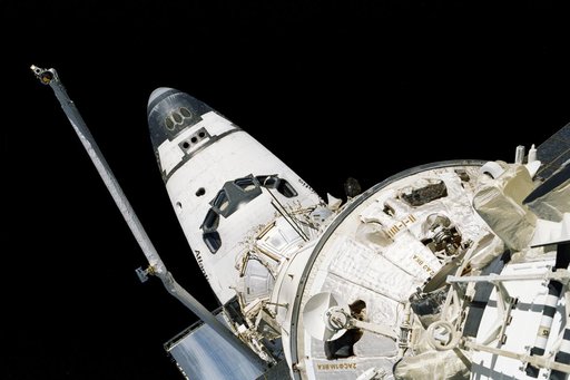 Aft end of FGB/Zarya looking towards docked orbiter