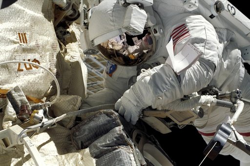 MS Lu at work on Zvezda during STS-106's EVA