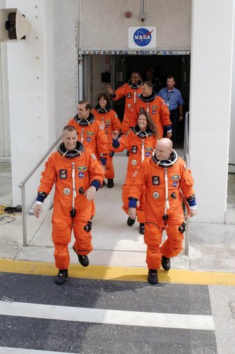 View of the STS-118 Crewmembers as they make their way to the KSC 39A Launch Pad