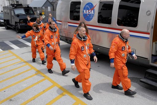 View of the STS-118 Crewmembers as they make their way to the KSC 39A Launch Pad