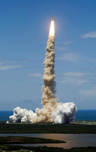 View of the orbiter Discovery during ascent after the launch of STS-121