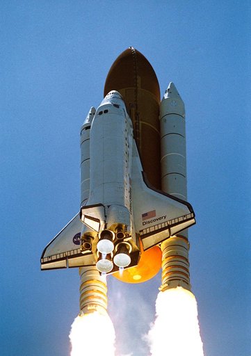 The orbiter Discovery ascent after launch for STS-121