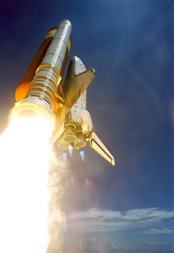 The orbiter Discovery ascent after launch for STS-121