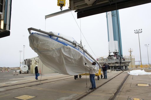 Delta II JPSS-1 Fairing Bi-Sector Halves Hoisted to MST