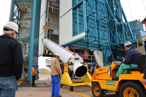Delta II JPSS-1 SRM Installation onto Booster