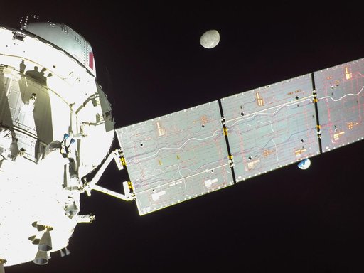Flight Day 14: Orion's Solar Array Divides Earth and Moon