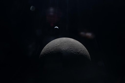Crescent Earth Over Lunar Horizon