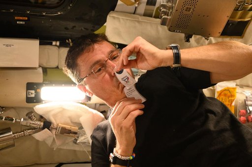 Reid Wiseman Collects Saliva Sample Aboard Orion
