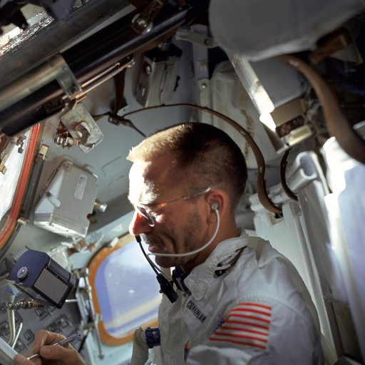 Astronaut Walter Cunningham photographed performing flight tasks