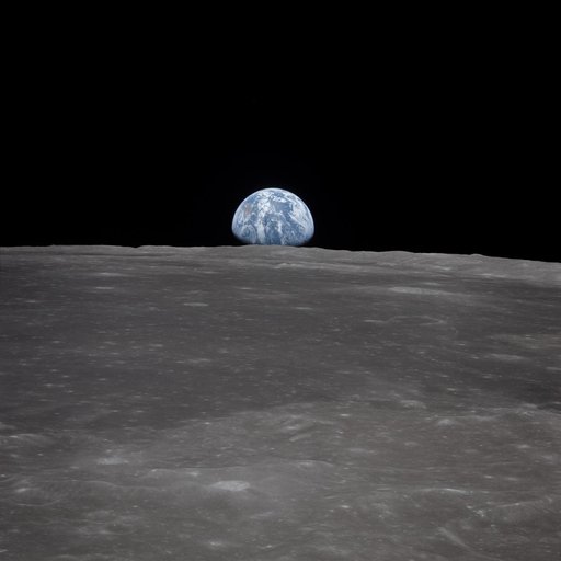 View of Earth rising over Moon's horizon taken from Apollo 11 spacecraft