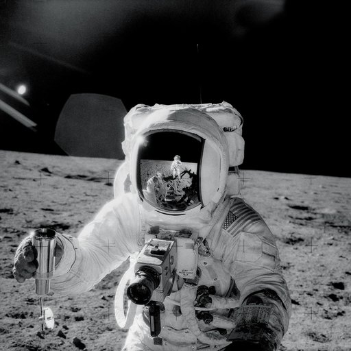 Astronaut Alan Bean holds Special Environmental Sample Container