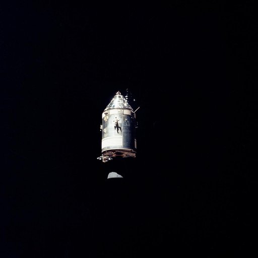 Apollo Command/Service Modules photographed against black sky