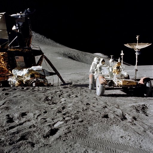 Astronaut James Irwin works at Lunar Roving Vehicle during Apollo 15 EVA