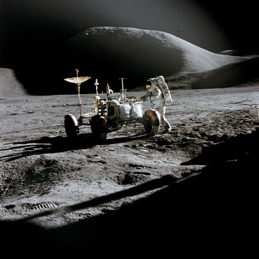 Astronaut James Irwin works at Lunar Roving Vehicle during Apollo 15 EVA