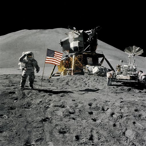 Astronaut James Irwin gives salute beside U.S. flag during EVA