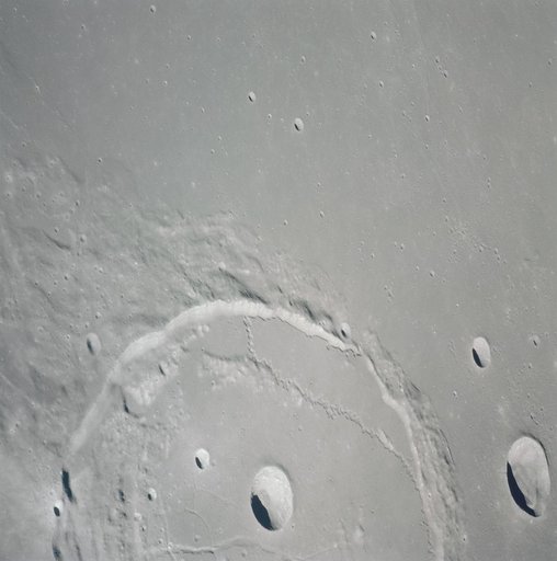 View of crater Posidonius at edge of Sea of Serenity seen by Apollo 15
