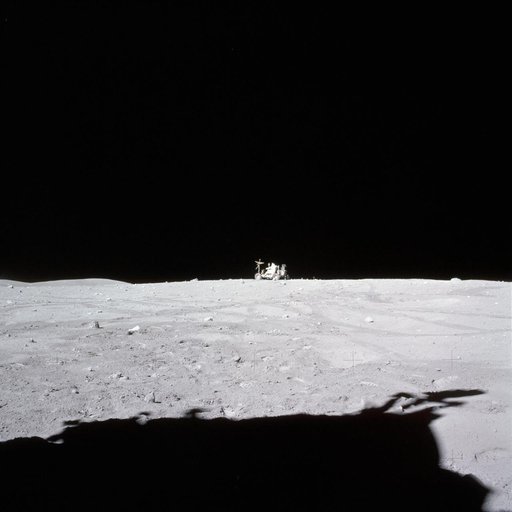 Astronaut John Young drives Lunar Roving Vehicle to final parking place