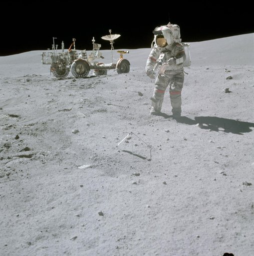 Astronaut John Young collecting samples at North Ray crater during EVA