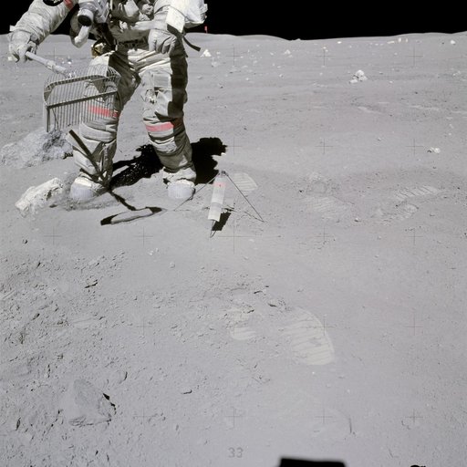 Astronaut John Young collecting samples at North Ray crater during EVA