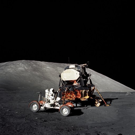 Astronaut Eugene Cernan drives the Lunar Roving Vehicle during first EVA